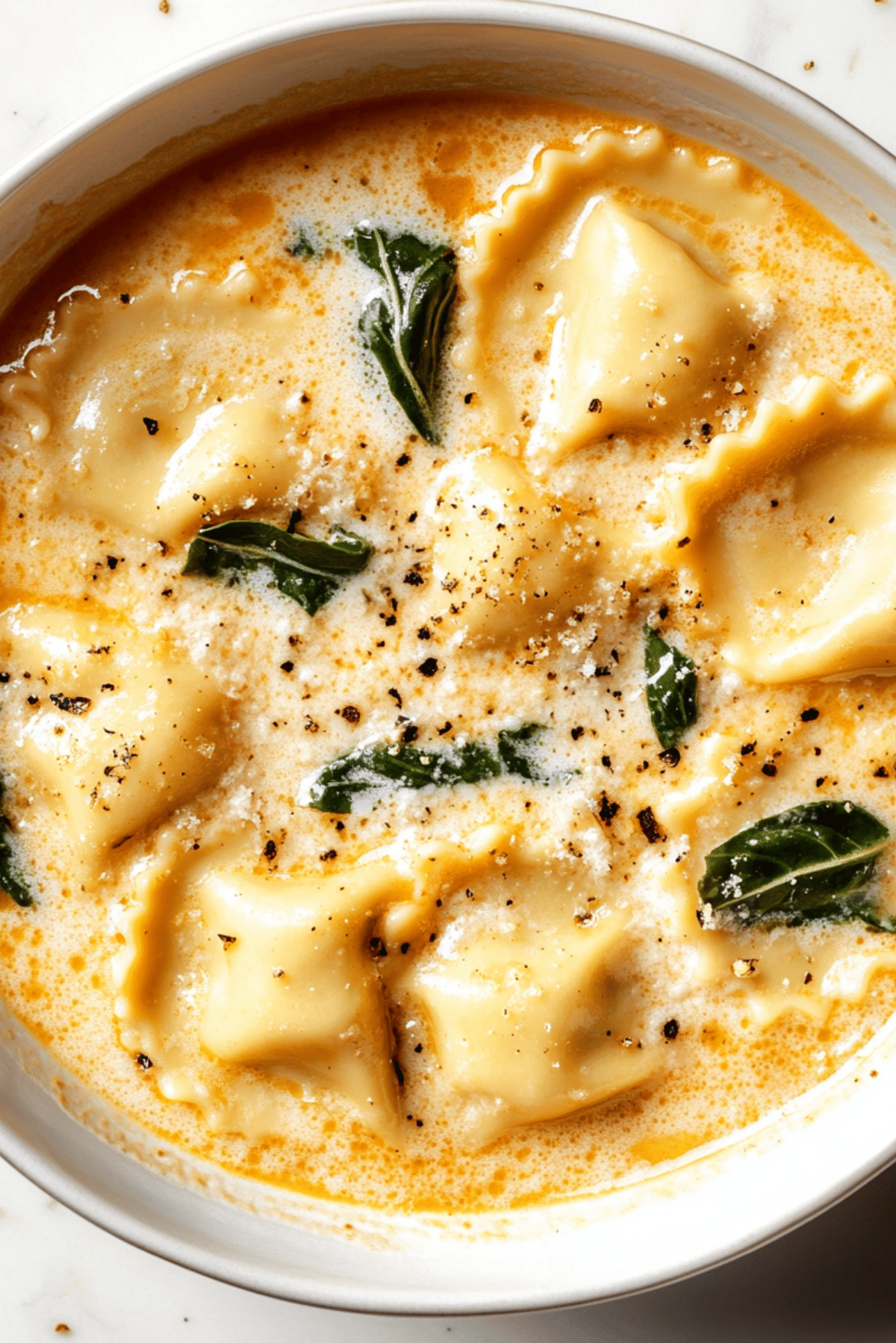 Creamy Tuscan Ravioli Soup | JustWorthi